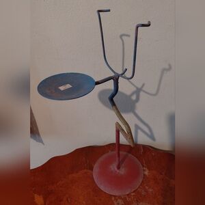 Vintage, hand-forged wrought iron candle holder